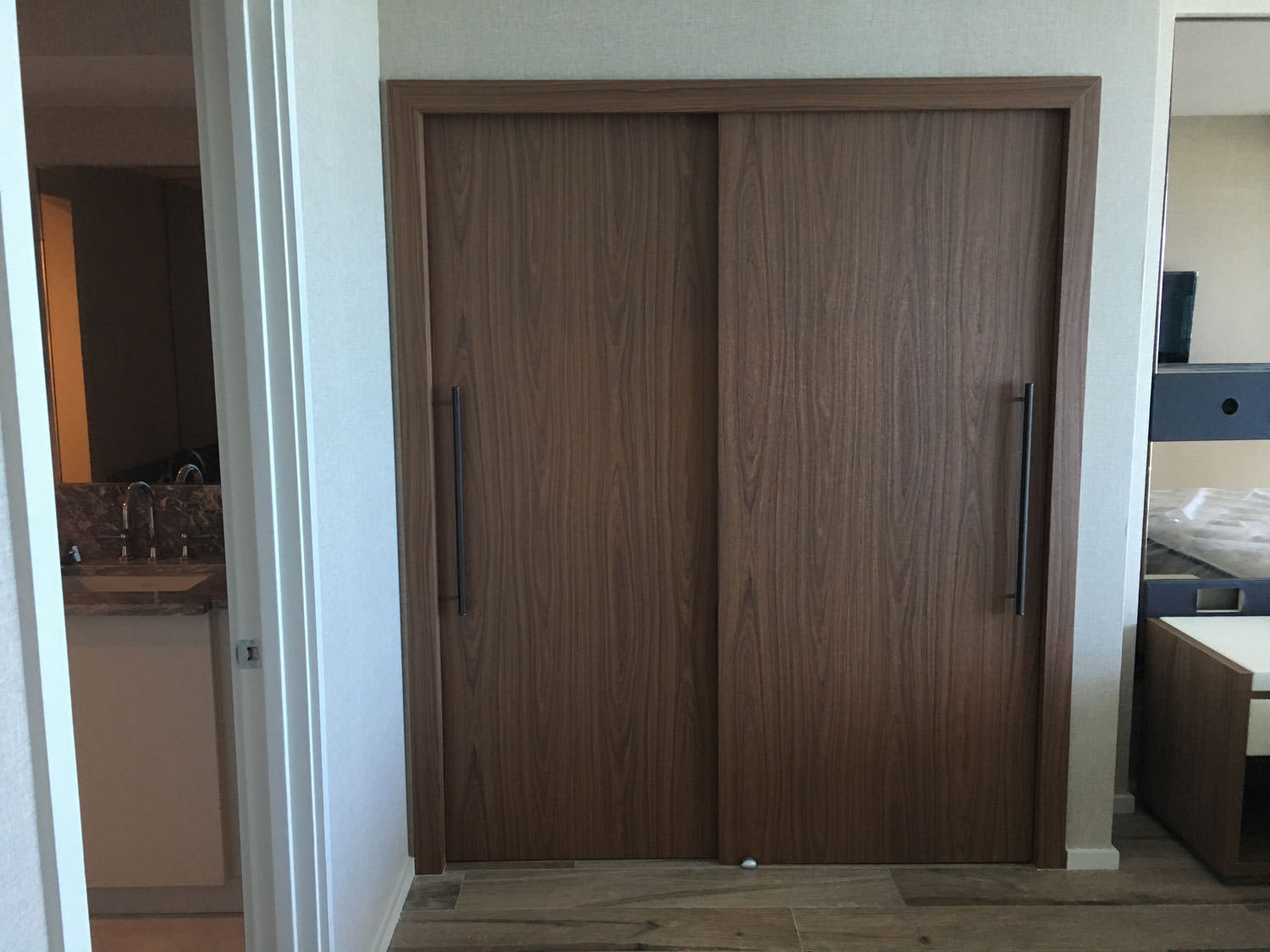 https://blueprintdoors.com/wp-content/uploads/2022/06/custom-wood-melamine-modern-closet-door-1.jpg